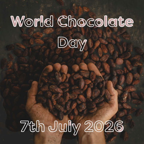 Hands holding a pile of cocoa beans against a dark background scattered with more cocoa beans. White outlined text reads "World Chocolate Day" at the top and "7th July 2026" at the bottom, celebrating the annual event.