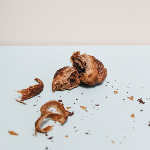 Day-old croissants ready to be repurposed into new bakery creations such as filled pastries, layered desserts and seasonal bakes, reducing food waste while adding value with quality ingredients and creative presentation.